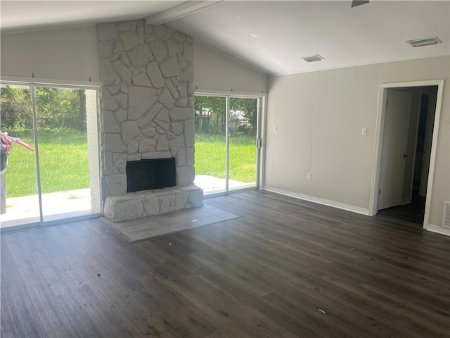 9424 Johnson Rd S, Mobile, AL 36695 - unfurnished living room featuring wood finished floors, baseboards, and a stone fireplace