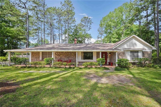 960 Abilene Dr, Mobile, AL 36695 - single story home with brick siding, a chimney, and a front lawn
