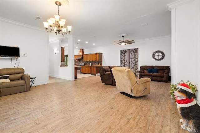 living room with crown molding, ceiling fan with notable chandelier, and light hardwood / wood-style floors