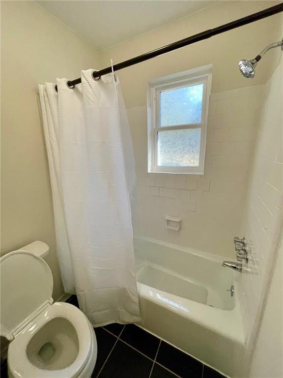 full bath with toilet, shower / bath combo, and tile patterned flooring
