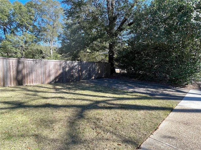view of yard with fence
