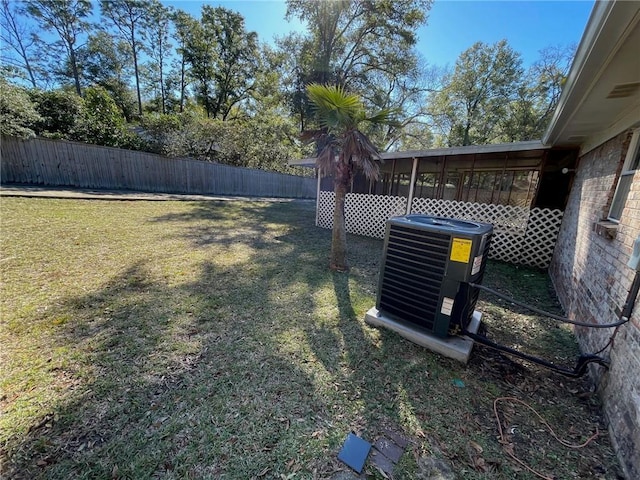 view of yard featuring cooling unit and a fenced backyard