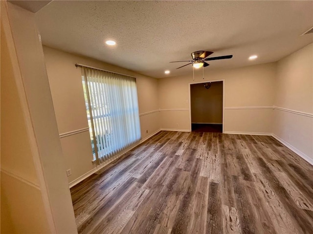 unfurnished room with recessed lighting, baseboards, and wood finished floors