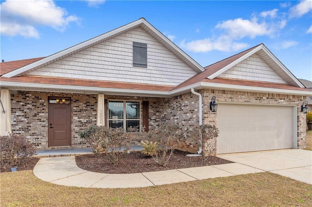 view of front of house with a garage and covered porch