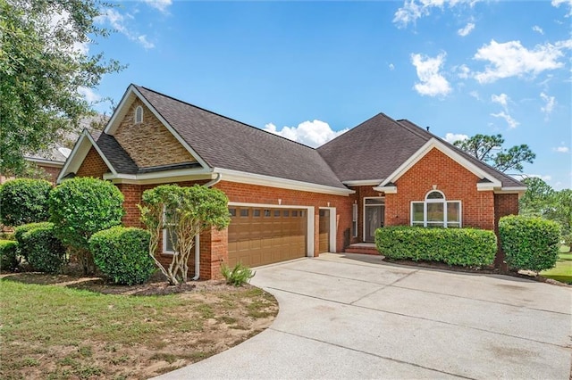 view of front of property with a garage