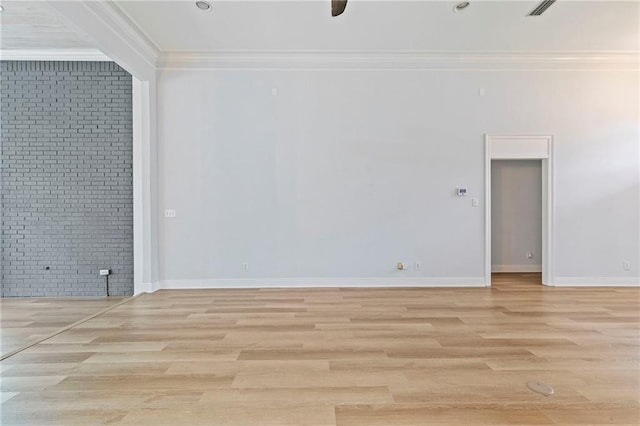 empty room with light hardwood / wood-style flooring, ceiling fan, and crown molding