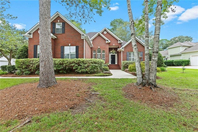 view of front of home featuring a front yard