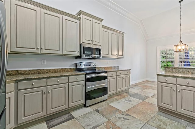 kitchen with ornamental molding, decorative light fixtures, a chandelier, appliances with stainless steel finishes, and dark stone countertops