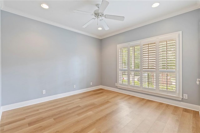 empty room featuring light wood-type flooring, ornamental molding, and ceiling fan