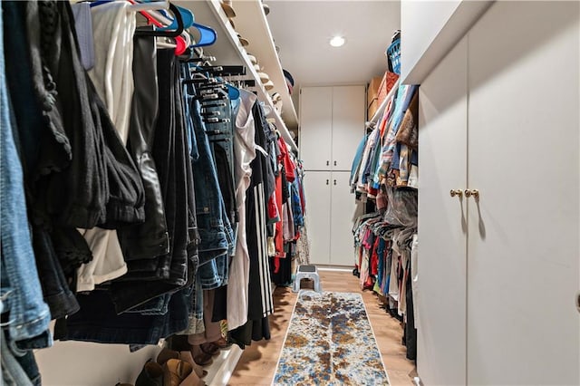 walk in closet featuring light wood-type flooring