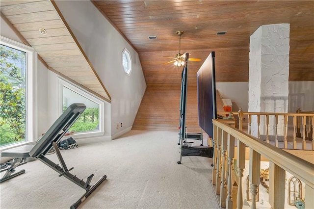 exercise area with carpet flooring, ceiling fan, wooden ceiling, and lofted ceiling