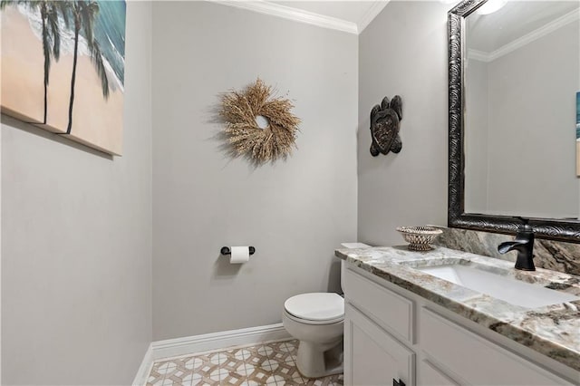 bathroom featuring tile patterned floors, vanity, toilet, and ornamental molding