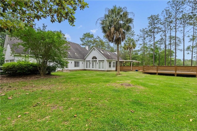 view of yard featuring a deck