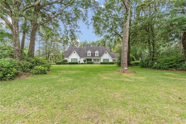 view of front of property with a front lawn