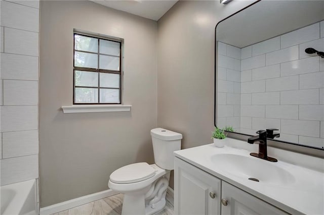 1112 Druid Dr, Mobile, AL 36618 - bathroom with baseboards, toilet, a bath, vanity, and a shower