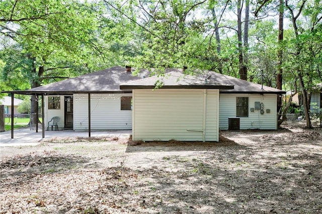 1112 Druid Dr, Mobile, AL 36618 - rear view of house featuring a patio, fence, and a shingled roof