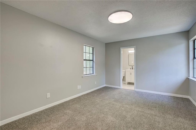 1112 Druid Dr, Mobile, AL 36618 - carpeted spare room with a textured ceiling and baseboards