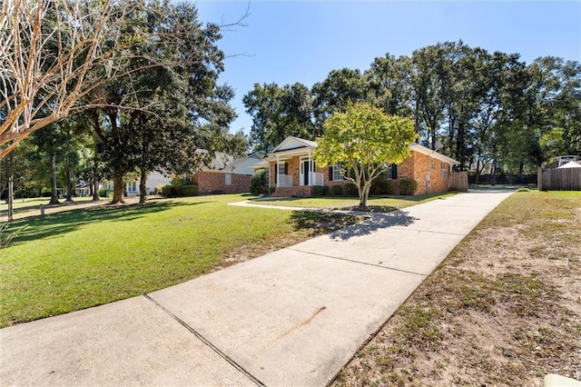 single story home with a front yard