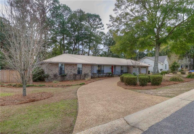 ranch-style home with a garage