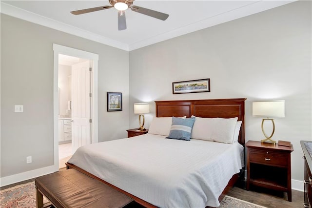 bedroom featuring dark hardwood / wood-style flooring, connected bathroom, crown molding, and ceiling fan