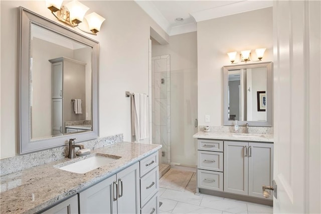 bathroom featuring a shower with door, vanity, and ornamental molding