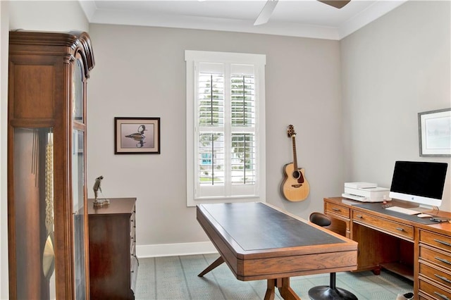 home office featuring crown molding and ceiling fan