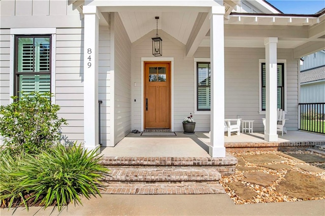 entrance to property with a porch