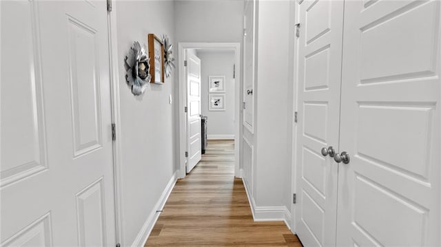 7320 Hawkins Mnr S, Mobile, AL 36695 - corridor with light wood finished floors and baseboards