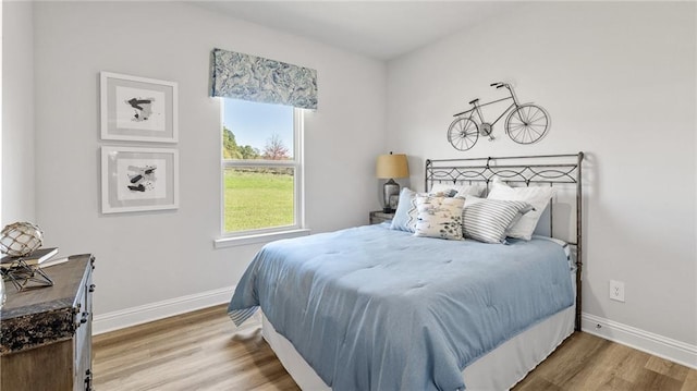 7320 Hawkins Mnr S, Mobile, AL 36695 - bedroom with wood finished floors and baseboards