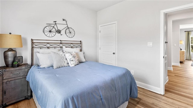7320 Hawkins Mnr S, Mobile, AL 36695 - bedroom featuring wood finished floors and baseboards