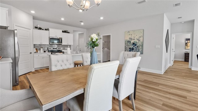 7320 Hawkins Mnr S, Mobile, AL 36695 - dining area with a chandelier, light wood-style floors, and recessed lighting