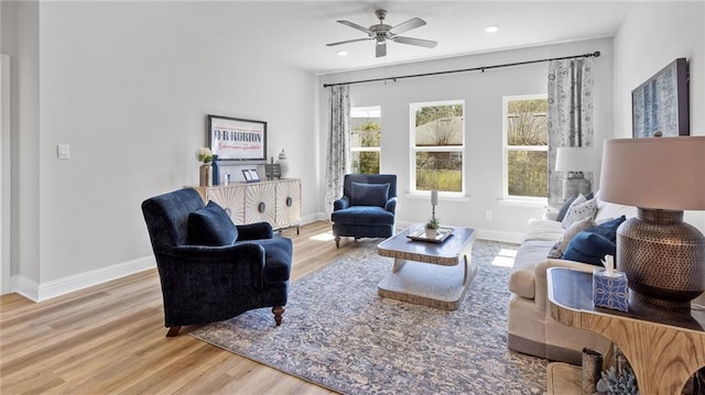 7320 Hawkins Mnr S, Mobile, AL 36695 - living area with wood finished floors, plenty of natural light, a ceiling fan, and recessed lighting