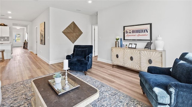 7320 Hawkins Mnr S, Mobile, AL 36695 - living area featuring light wood finished floors and recessed lighting
