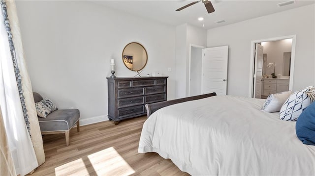 7320 Hawkins Mnr S, Mobile, AL 36695 - bedroom with light wood finished floors, connected bathroom, ceiling fan, and recessed lighting