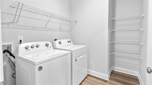 7320 Hawkins Mnr S, Mobile, AL 36695 - washroom with independent washer and dryer and light wood-type flooring