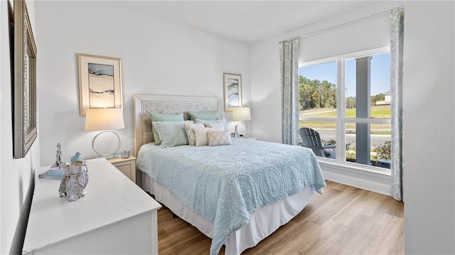 7320 Hawkins Mnr S, Mobile, AL 36695 - bedroom featuring wood finished floors