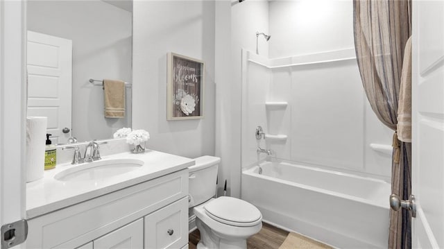 7320 Hawkins Mnr S, Mobile, AL 36695 - bathroom featuring shower / tub combo, vanity, and wood finished floors