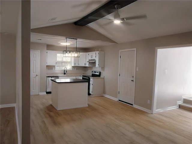 kitchen with white cabinets, light hardwood / wood-style flooring, stainless steel appliances, pendant lighting, and a center island