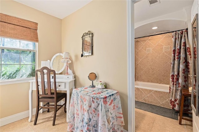 sitting room with light tile patterned floors