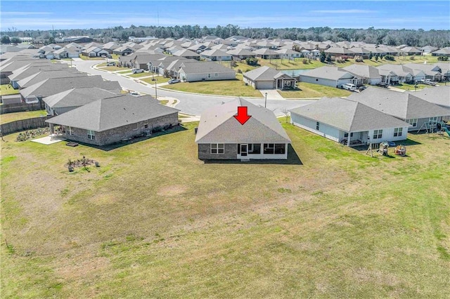 drone / aerial view featuring a residential view