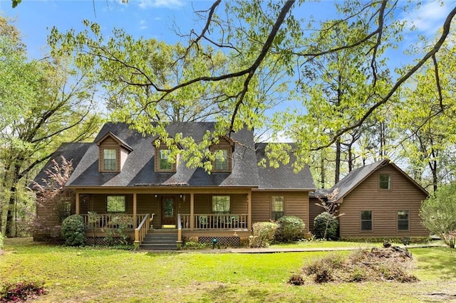 3425 Poe Rd S, Chunchula, AL 36521 - view of front facade featuring a front lawn and covered porch