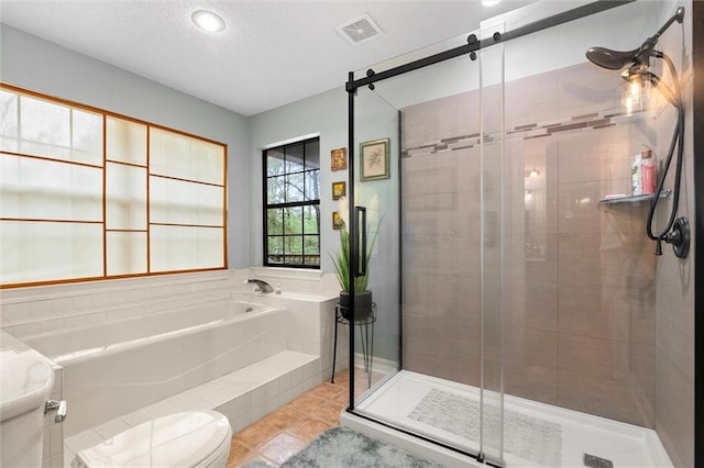 3425 Poe Rd S, Chunchula, AL 36521 - full bathroom with a bath, a shower stall, and tile patterned floors