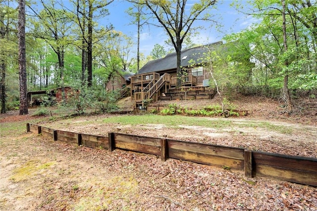 3425 Poe Rd S, Chunchula, AL 36521 - view of yard featuring stairway and a wooden deck