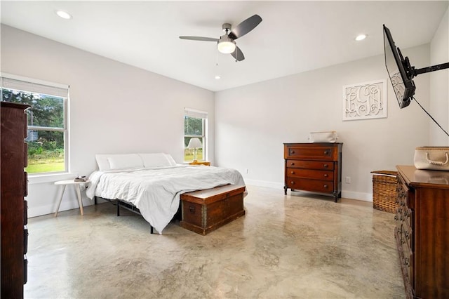 11531 Schmidt Ln S, Mobile, AL 36695 - bedroom with multiple windows, finished concrete flooring, ceiling fan, and recessed lighting