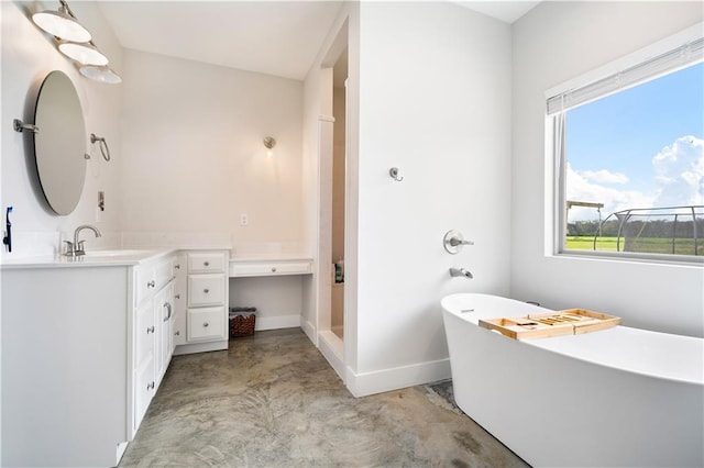 11531 Schmidt Ln S, Mobile, AL 36695 - full bath with finished concrete floors, vanity, and a soaking tub