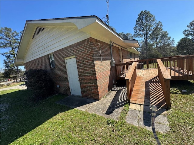 view of home's exterior featuring a wooden deck, a lawn, and central air condition unit