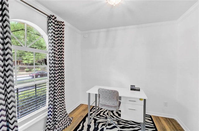 home office with baseboards, ornamental molding, and wood finished floors