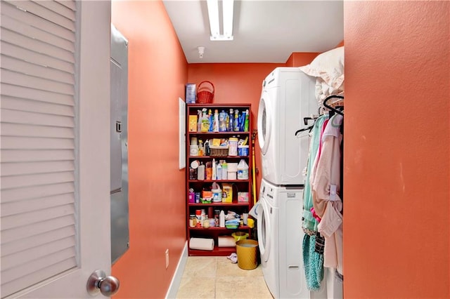 pantry with stacked washing maching and dryer