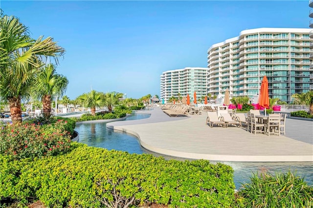 view of swimming pool featuring a water view