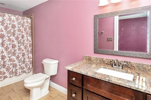 bathroom featuring toilet, shower / bath combo, vanity, baseboards, and tile patterned floors